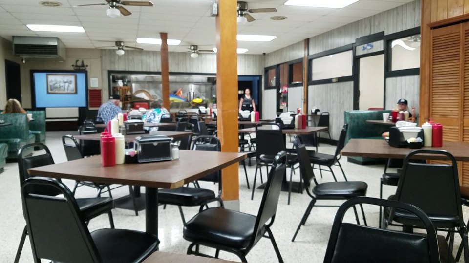 Dining space set for dinner service.